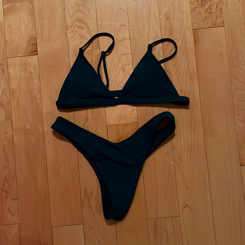women’s/teens small bikini, very comfortable, a lot of support, washable pads.
